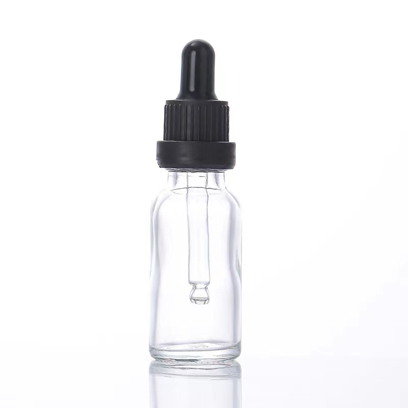 Botella cuentagotas de vidrio transparente de 30 ml con tapa cuentagotas negra 