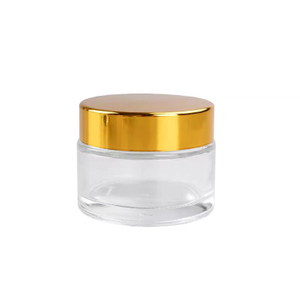 Tarro de vidrio transparente con tapa de aluminio dorado de 50 ml