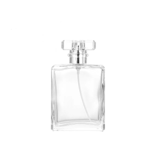 Botella de perfume de cristal transparente con forma de rectángulo de 100 ml con tapa de acrílico 