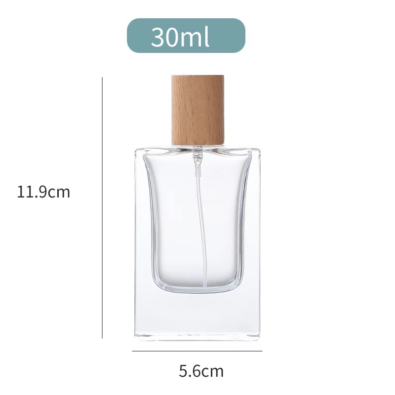 Botella de cristal del rociador de perfume 30ml con diverso casquillo de madera 